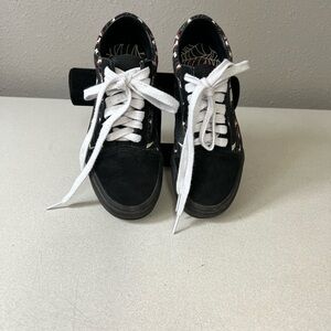 Vans Kids Black Skate Sneakers with White Laces and Pink Accent